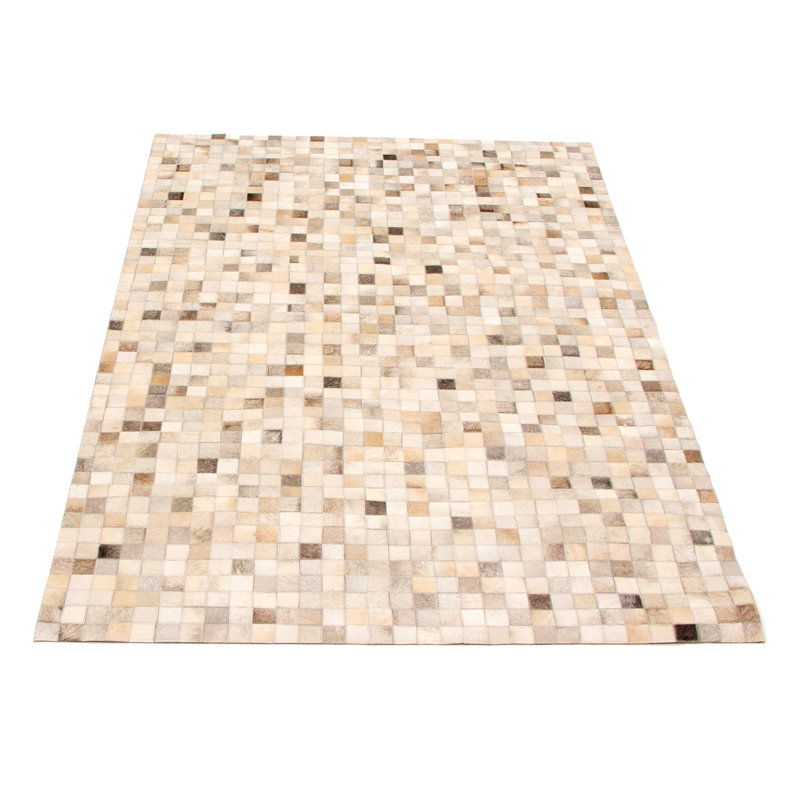 Tapis gris / beige / brun en cuir de vache fabriqué à la main Arvell