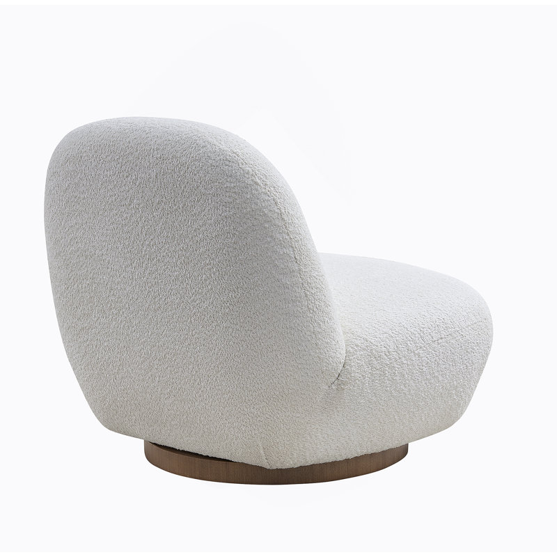 Luxueux fauteuil d'appoint pivotant moderne avec dossier incurvé, conception sans accoudoirs, idéal pour le salon, un appartement et un espace de réception