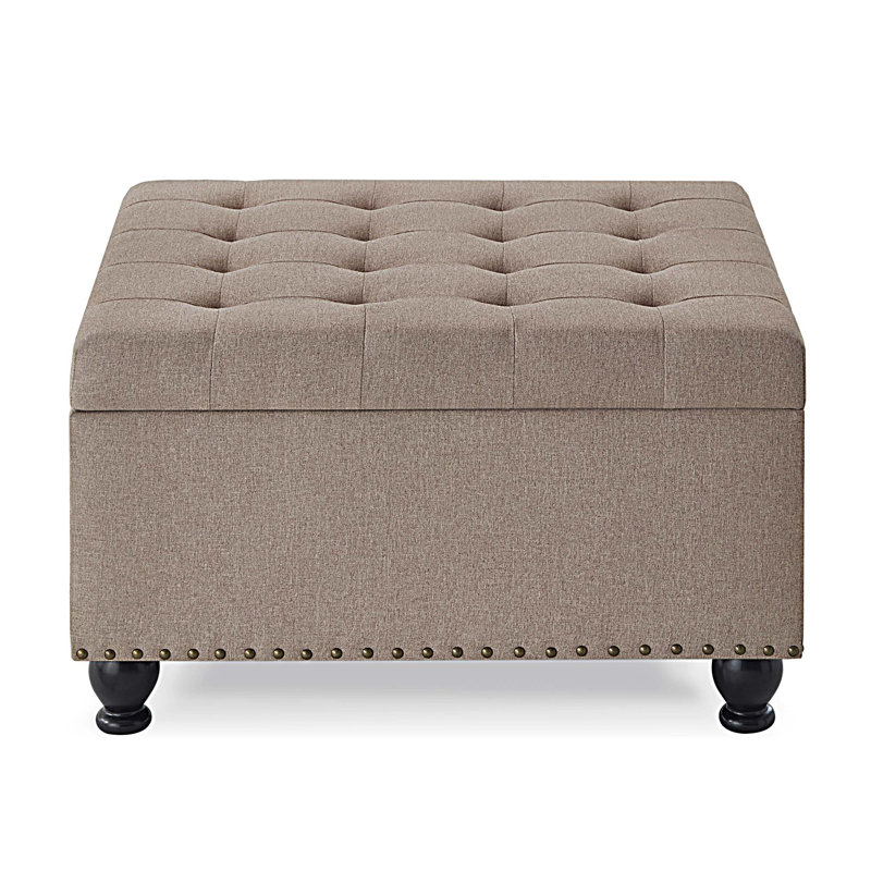 Grand repose-pieds de rangement carré avec pieds en bois, table basse capitonnée avec garniture cloutée pour plus d'espace de vie