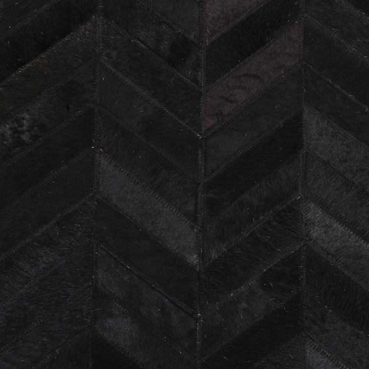 Meir Leather Chevron Area Rug in Black