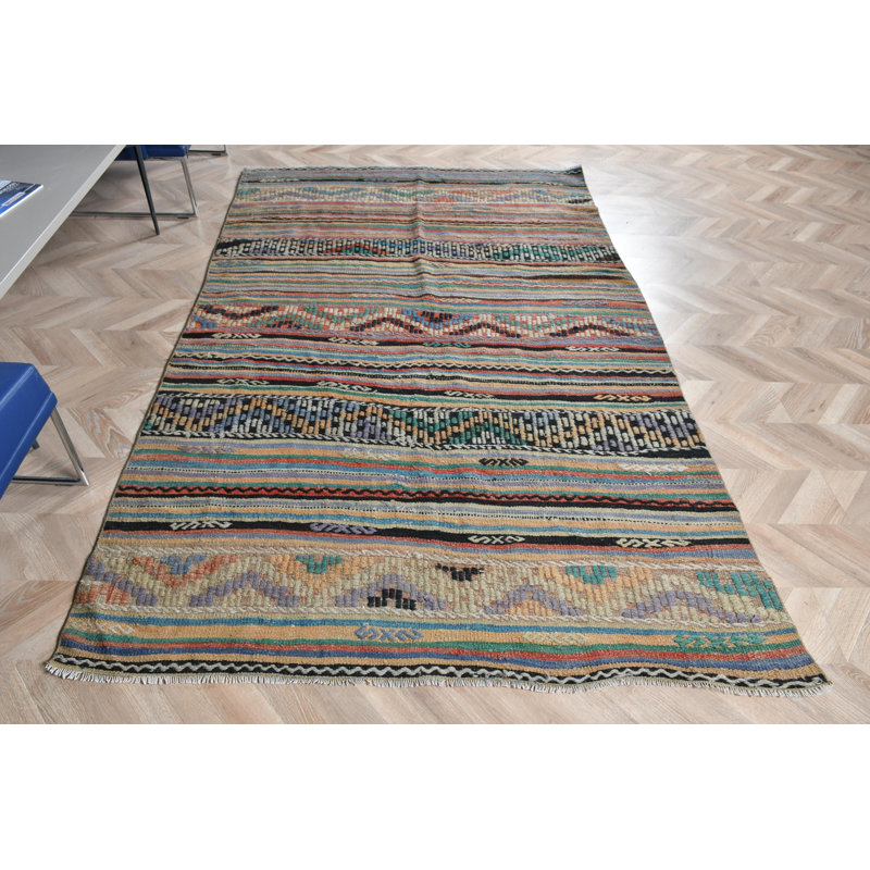 Grand tapis turc en laine à motif rétro avec pampilles pour votre salon en vert