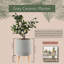 Porte-pot en céramique gris George Oliver pour plantes avec pieds en bois, à utiliser comme plante en pot avec support