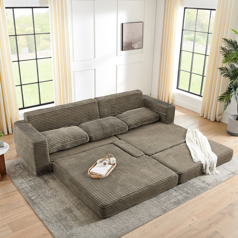 Canapé modulaire en L brun à assise large pour conversation en famille