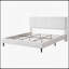 Lit simple moelleux blanc simple et moderne avec dossier confortable et structure stable, idéal pour les chambres confortables et élégantes-873194736-873194741