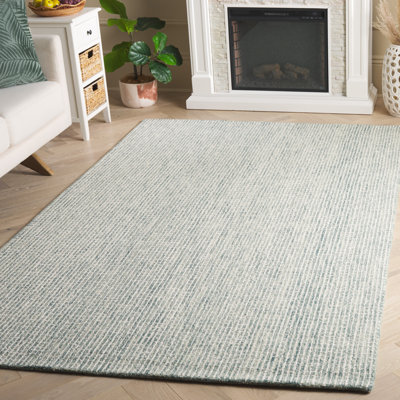 Ebony Hand Tufted Wool/Polyester Area Rug in Ivory/Green