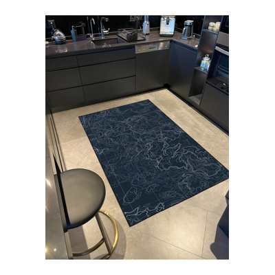 Tapis noir lavable à rayures