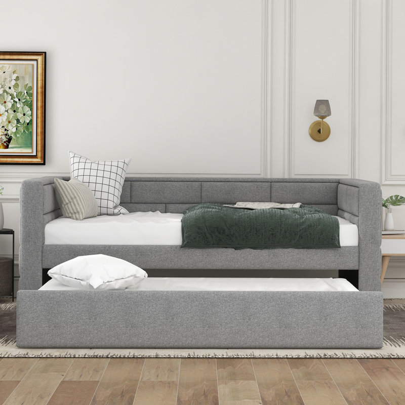 Lit de jour simple avec lit gigogne, rembourré en gris, rembourrage confortable de la taille du dossier, fabrication