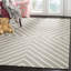 Tapis en laine touffeté à la main Clust-945211896-1070525623