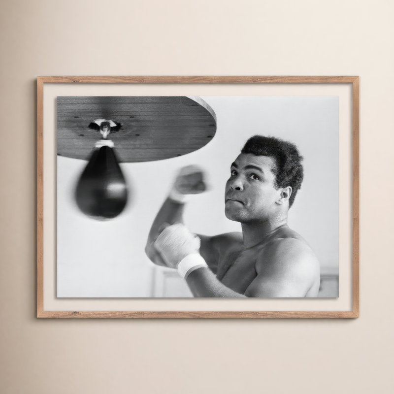 Muhammad Ali Punching Bag Print by Getty Images, 36" H x 48" W, Rustic Walnut Framed