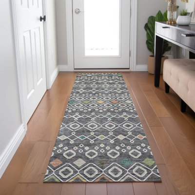 Tapis rectangulaire Aleighna avec envers antidérapant