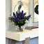 Italian Lilac Floral Arrangement In A Cylindrical Glass Vase
