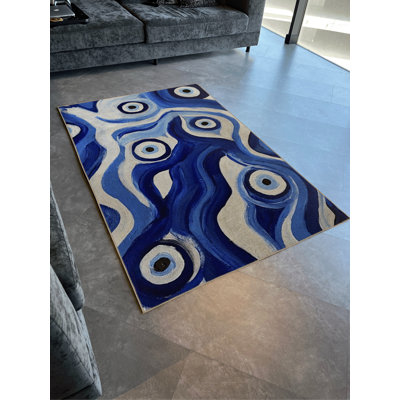 Tapis décoratif moderne à motif ondulé et bleu