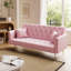Canapé-lit deux places de 180 cm en velours rose, style rétro américain, idéal pour un petit salon, une chambre ou un bureau.