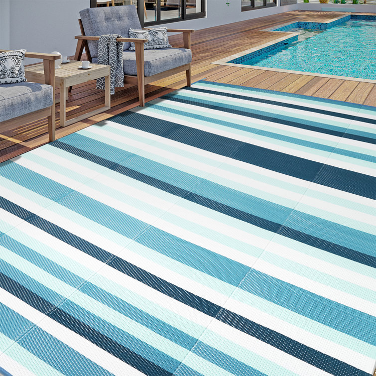 Ebern Designs Lobdell Waterproof Turquoise Striped Reversible Outdoor ...