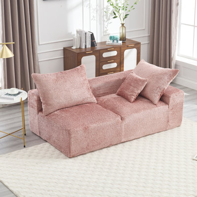 Chenille rose avec un design confortable et élégant confortable pour un espace de vie chaleureux et invitant