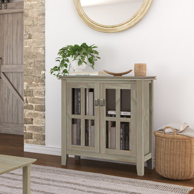 Artisan 30"W Solid Wood Transitional Low Storage Cabinet with Glass Doors and Adjustable Shelves by Simpli Home