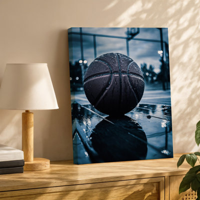 Toile, vue rapprochée d'un ballon de basketball mouillé reposant sur un mur d'art