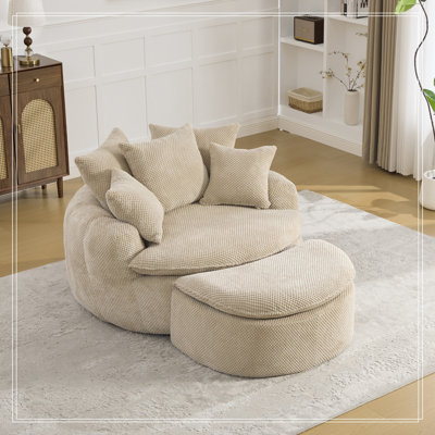 Causeuse ronde sans os avec coussins et repose-pieds