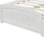 Lit simple blanc avec deux supports de tiroir en bois massif pour une structure de chambre à coucher stable