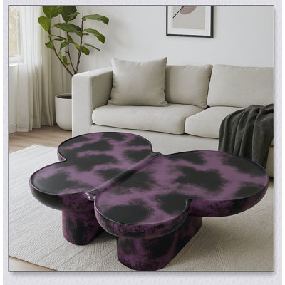 Table basse moderne en faux travertin texturé avec forme de papillon pour les salons et les bureaux élégants