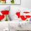 Coussin lombaire floral avec éclaboussures de tulipes brillantes