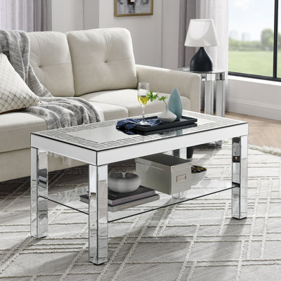 L 40 po x P 20 po x H 20 po Table basse à bordure incurvée et sculptée