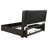 Burnished Black 55 Inch Eastern King Wingback Bed Dramatic Silhouette