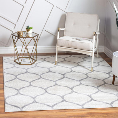 Tapis contemporain Tellaro de couleur crème