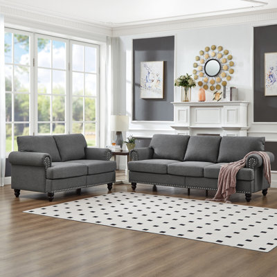 Canapé en tissu 5 places moderne et classique pour le salon, revêtement en gris, rond avec clous argentés, structure en bois massif, coussins amovibles, rangement sous les sièges, décoration pour clous à 2 ou 3 places,