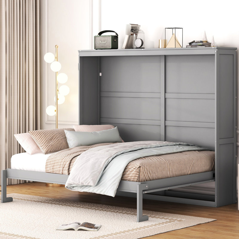 Grand lit gris, parfait pour les chambres d'amis et la vie compacte, facile à utiliser avec un lit escamotable avec des lattes flexibles.