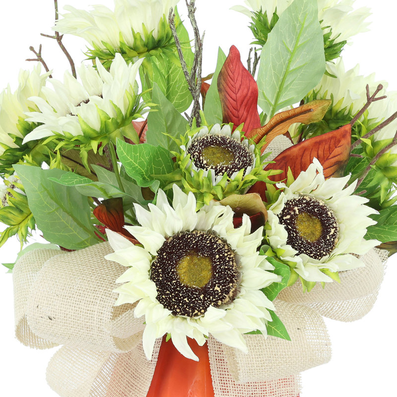 Fall Arrangement with Sunflowers and Magnolia Leaves in Pumpkin Vase