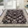 Tapis noir 100% polypropylène Clervil