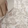 Cristiaan Damask Machine Woven Polypropylene Area Rug in Beige