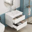 Meuble-lavabo simple autoportant blanc brillant 24 po avec lavabo en céramique, 2 grands tiroirs à fermeture en douceur, sans poignée, facile à assembler-131139122