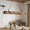 Luminaire suspendu linéaire à DEL 4 lumières avec îlot de cuisine en métal noir et bois Breiden pour salle à manger ou cuisine Breiden