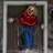Wiggles the Animatronic Twisting, Talking Clown Greeter with Folding Door Hook for Scary  Decoration