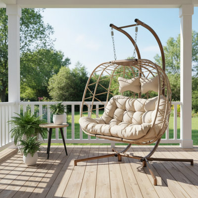 Extra-Large Beige Double Rattan Hanging Chair With Frame And Comfortable Cushions. A Versatile Indoor/Outdoor Swing Egg Chair, Sturdy With A 700-Pound Weight Capacity, Suitable For Patios And Porches.