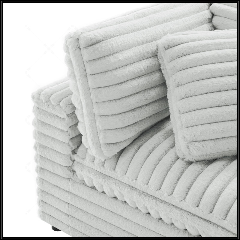 Canapé modulaire Cassandra avec tissu durable et confort moelleux, parfait pour les espaces familiaux et les animaux de compagnie.