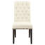 Table à manger cinq pièces moderne: table à double piédestal en bois et quatre chaises rembourrées crème avec garniture cloutée