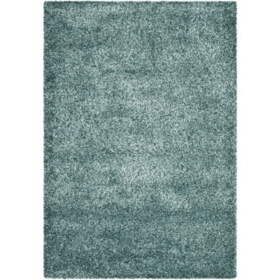 Tapis turquoise uni à longs poils Martelange