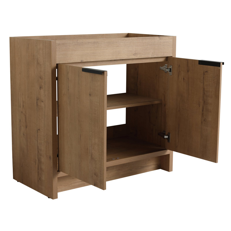 Armoire de salle de bain autoportante avec lavabo en porcelaine. Charnières en acier inoxydable à 2 portes. Look moderne en chêne imitationnel. Tablette réglable d'espace supplémentaire. Contreplaqué en céramique blanche facile à assembler facile à assembler