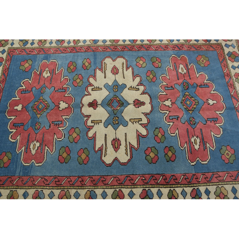Tapis turc traditionnel tissé à la main avec des motifs géométriques bleus vifs pour une décoration intérieure élégante