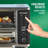 PowerXL SmartSynx Dual Door Oven, 8 Quick-Touch Cooking Presets including Air Fry, Toast, Bake & Broil, Large Capacity, Cooks 2 Foods Simultaneously.