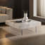 Table basse chic avec motif en faux travertin et pieds en acrylique robustes