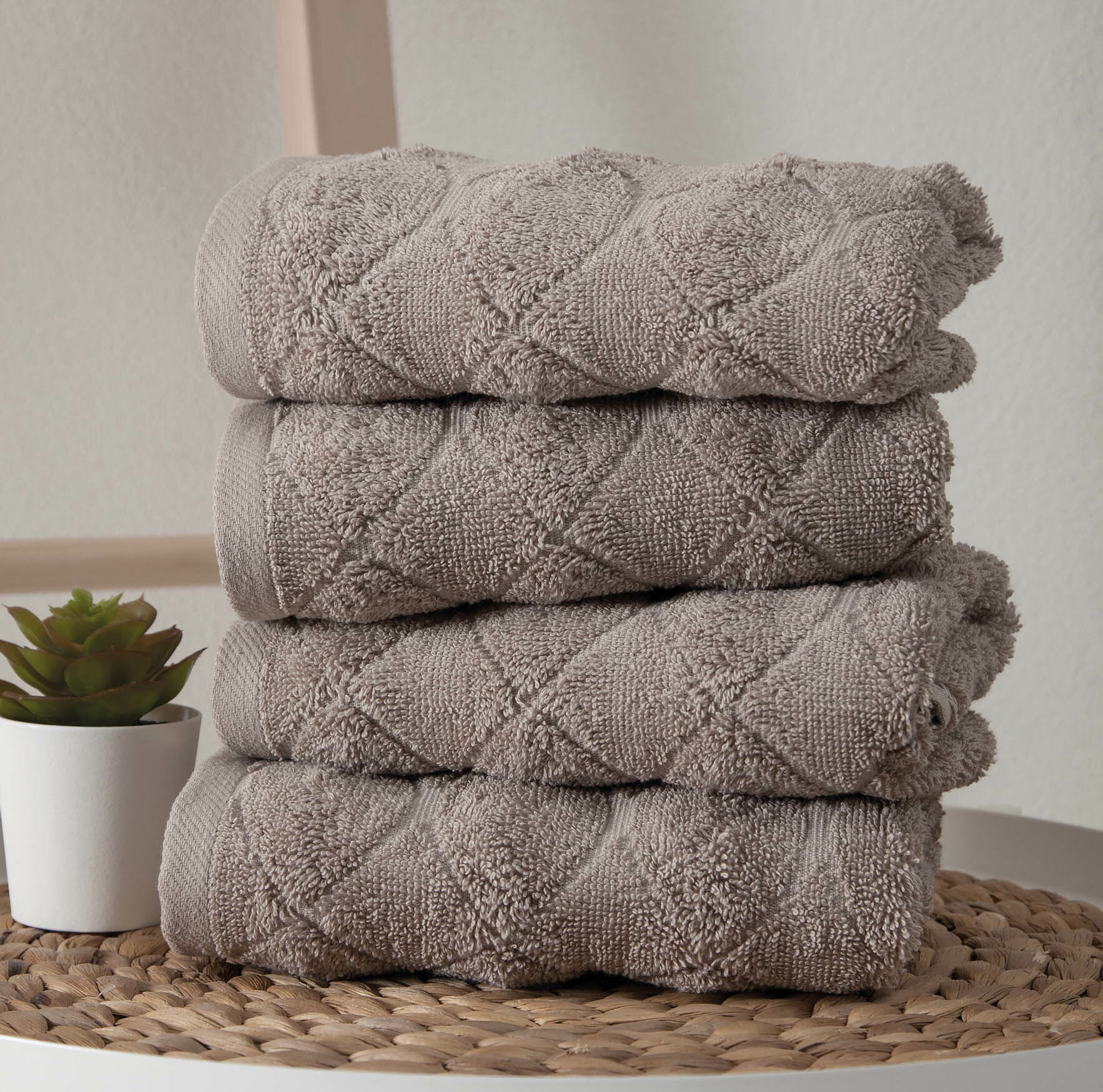 https://assets.wfcdn.com/im/66753910/compr-r85/1071/107189594/ozgur-4-piece-turkish-cotton-hand-towel-set.jpg