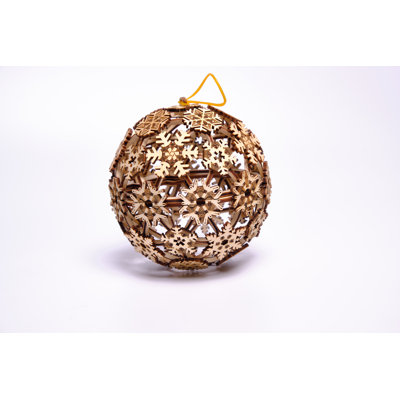 Trick en bois boule de Noël