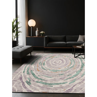 Tapis gris soyeux et moelleux