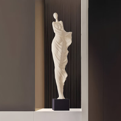 31.5"Eggshell-colored resin figurine with a black marble base