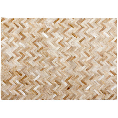 Espina Cowhide Geometric Area Rug in Caramel