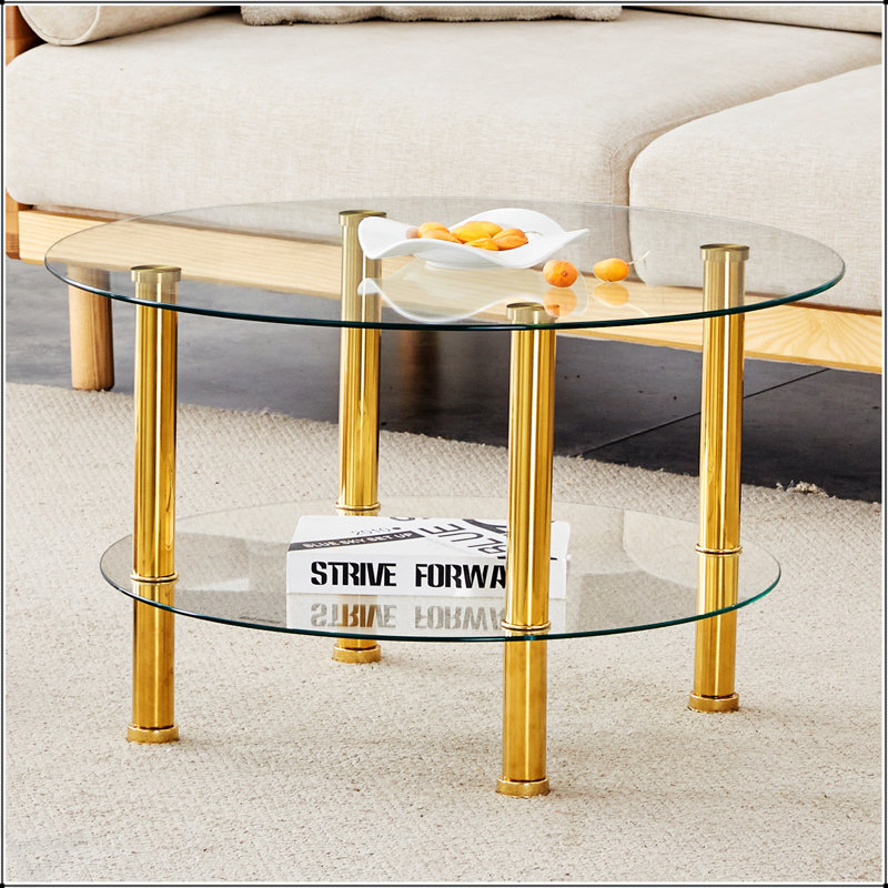 Table basse contemporaine en verre trempé à double couche - plateau et bas renforcés, pieds plaqués or en acier inoxydable.